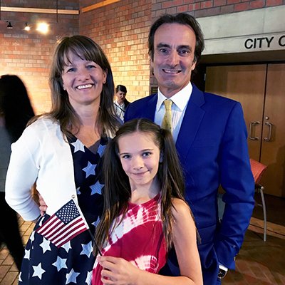 father natzed shown with family LIttleton Colo red white and blue clothes